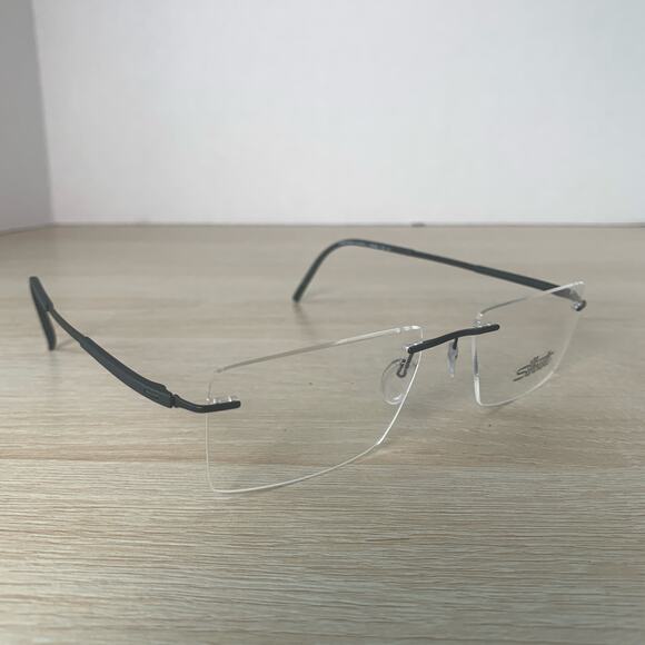 NWOT Silhouette 5540 DR 9040 Eyeglasses Rimless Titan Black Frame Only 54-19-140